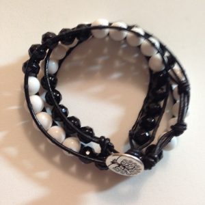 Made with white Jade beads and black facetted onyx beads