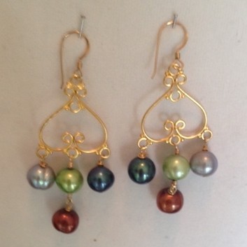Earrings made with beautfiul fresh water pearls, gold and crystals