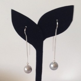 Earrings with Pearls hanging from a Silver Thread