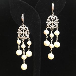 Earrings made with Pearls, Crystals, and Silver