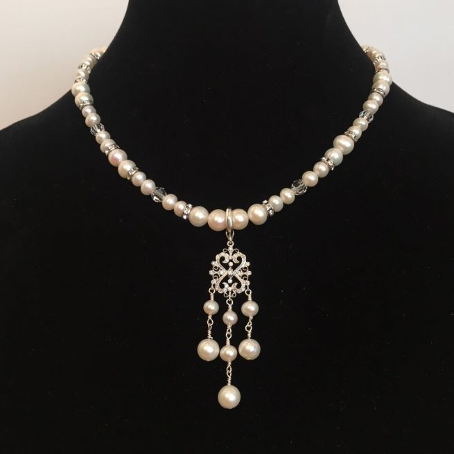 Nacklace made with Pearls, Crystals, and Silver
