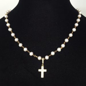 Pearls and diamante cross necklace