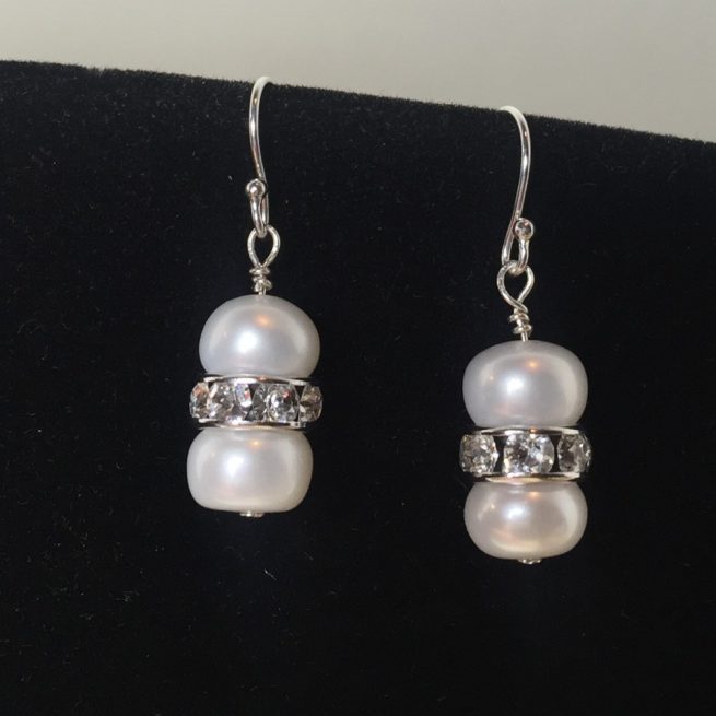 Earrings made with pearls and crystals