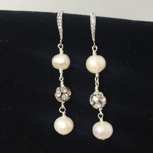 Earrings made with pearls, crystals and silver