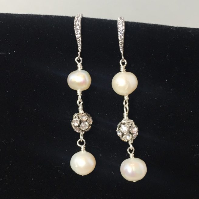 Earrings made with pearls, crystals and silver