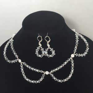 Set of earrings and necklace made with crystals and silver