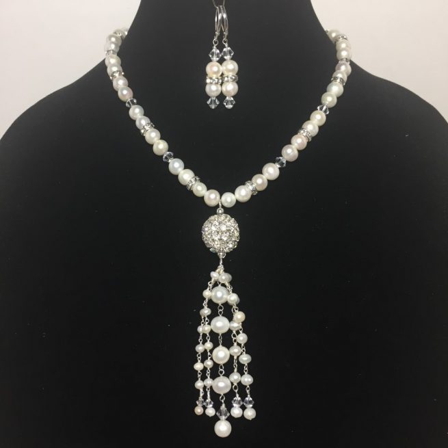 Earrings and necklace made with Crystals and Pearls